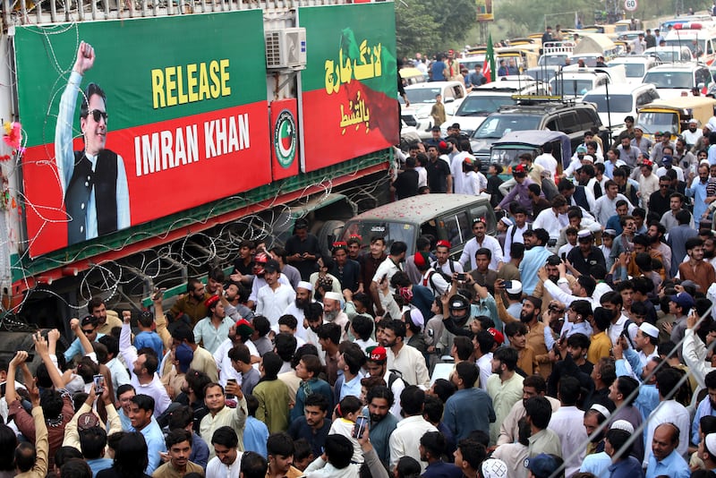 The marchers are demanding Imran Khan's release from prison. EPA