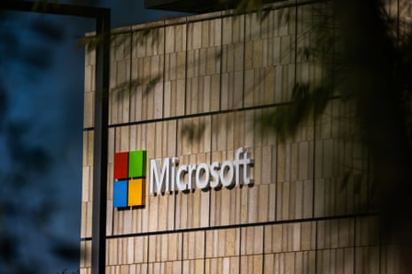 The Microsoft logo and sign on a tiled wall at its Mountain View campus